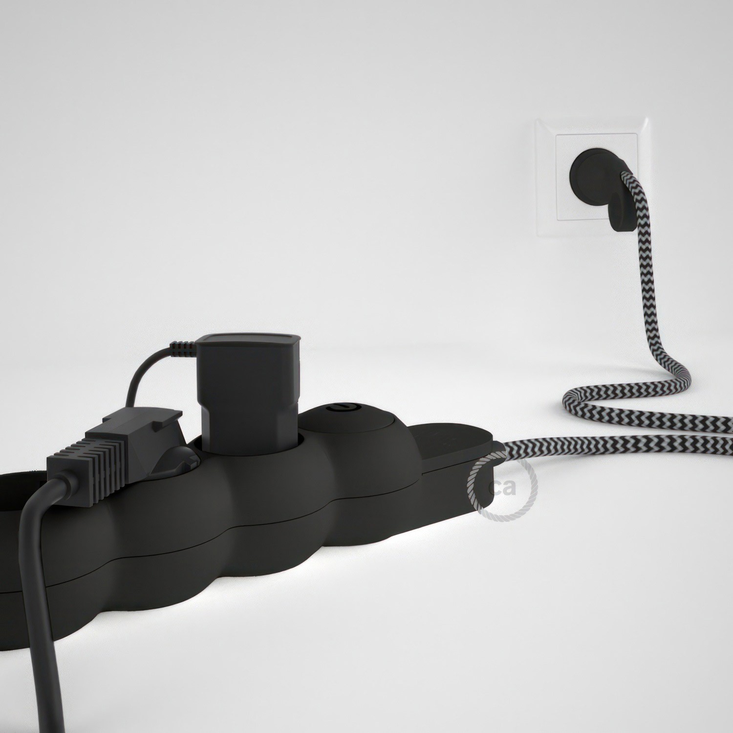 German power strip with electrical cable covered by rayon ZigZag Black RZ04 and Schuko plug with confort ring
