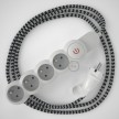 French power strip with electrical cable covered by rayon ZigZag Black RZ04 and Schuko plug with confort ring