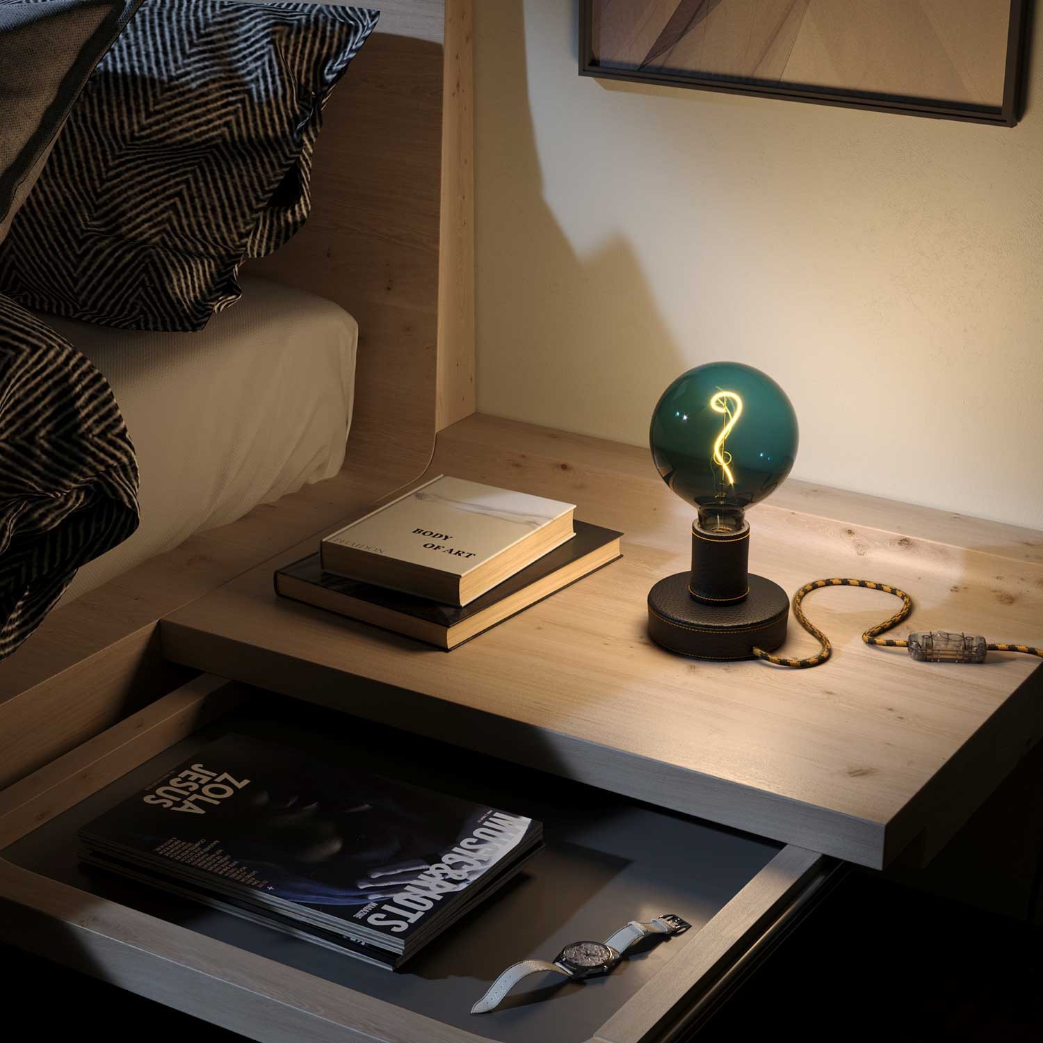 Posaluce Leather, our table lamp in leather complete with fabric cable, switch and 2-pin plug