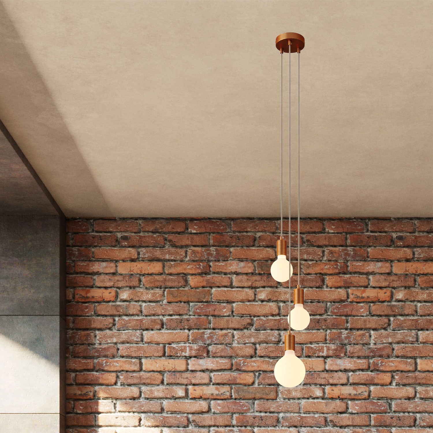 3-light multi-pendant lamp featuring fabric cable and metal finishes