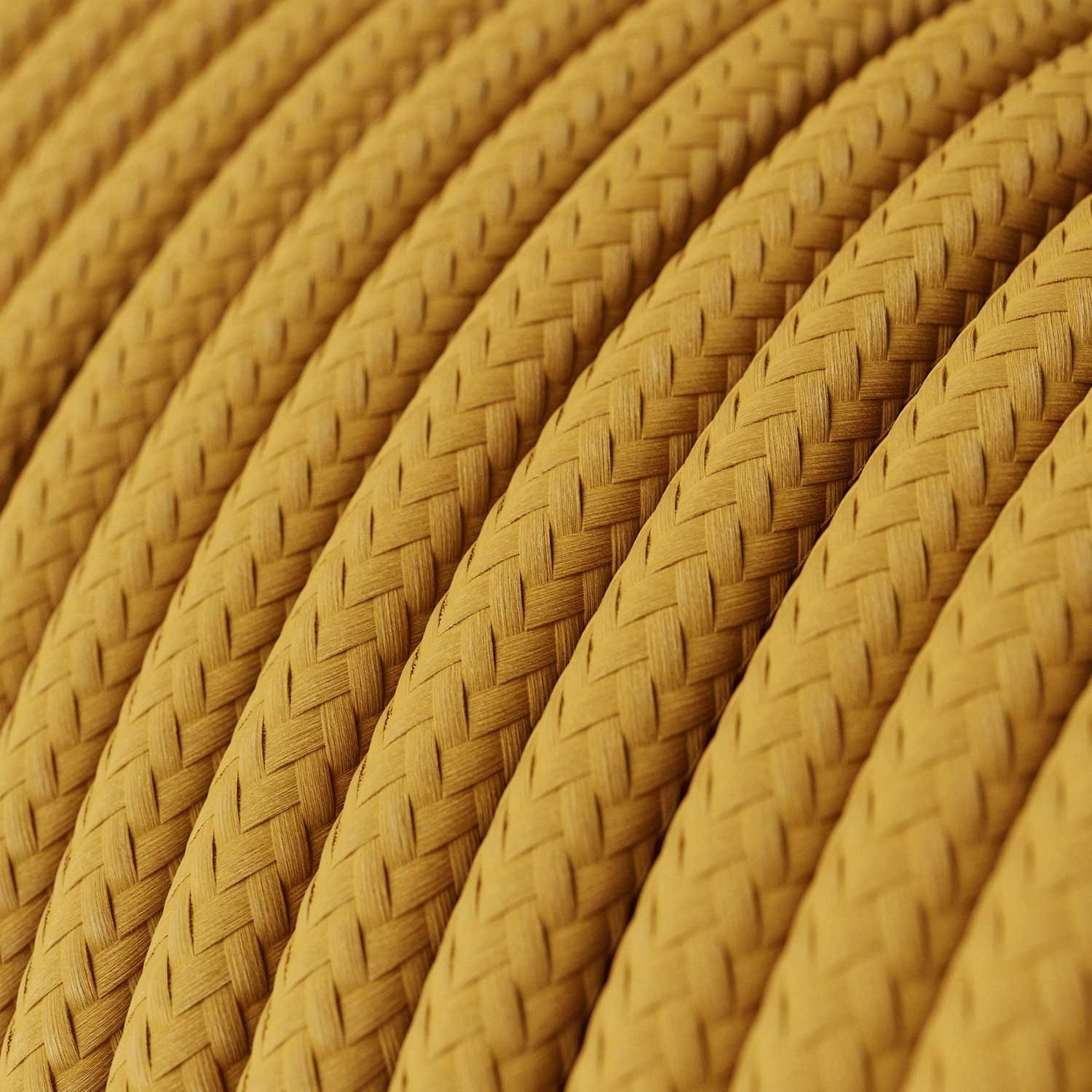 Lámpara colgante de silicona colorida con cable textil.