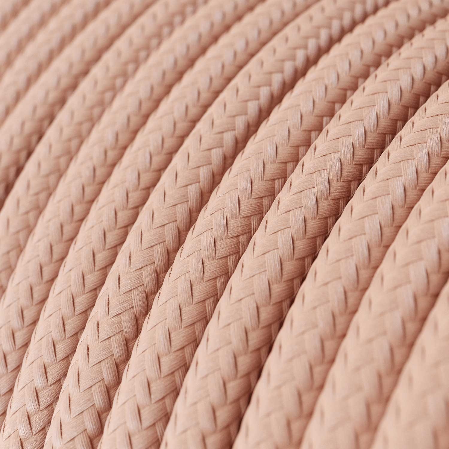 Lámpara colgante de silicona colorida con cable textil.