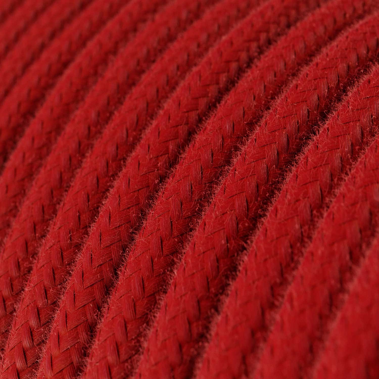 Lámpara colgante de silicona colorida con cable textil.
